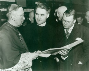 Photograph from the opening ceremony for the Archives at CUA, December 8, 1949, with, left to right, Patrick O'Boyle, Archbishop of DC and Chancellor of the University, Fr. Henry Browne, first CUA Archivist, and Wayne Grover, Archivist of the United States