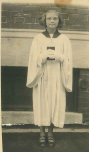 Virginia Farley Mazzenga, avid fan of Bishop Fulton Sheen, in her confirmation robe, ca. 1953. An avid follower of Sheen’s Life is Worth Living at the time, she says when she watched him on TV it was “as if nothing else was happening in the room. The way he was able to put the teaching over was out of this world.” 